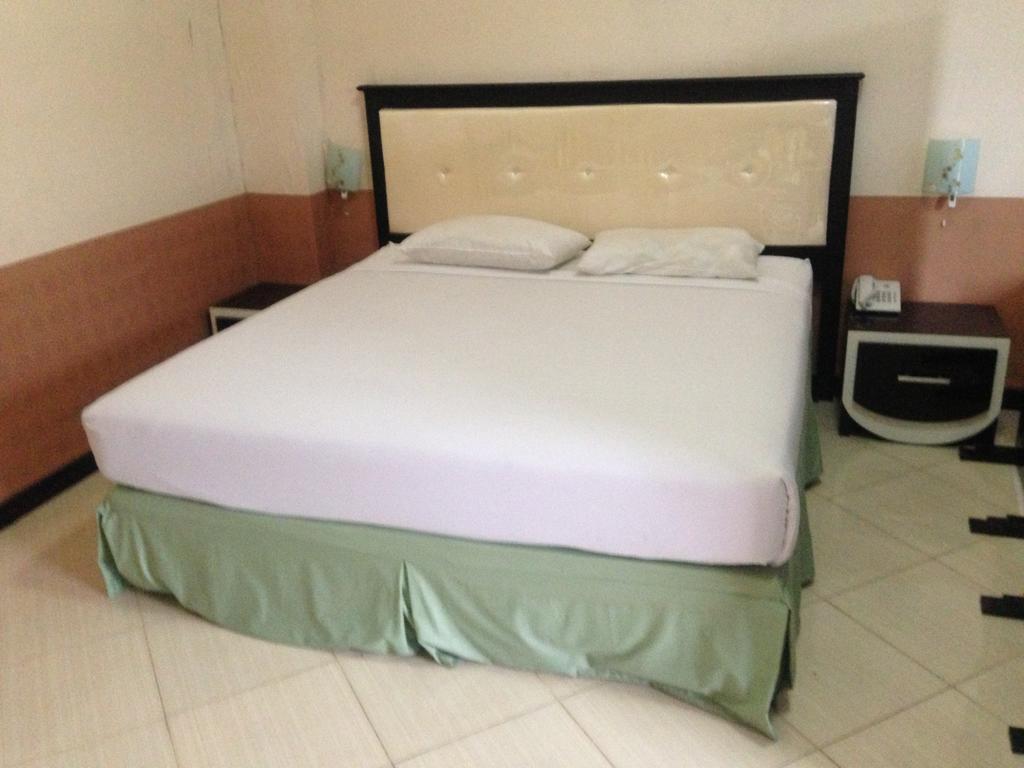Global Inn Keluarga Sedati Quarto foto